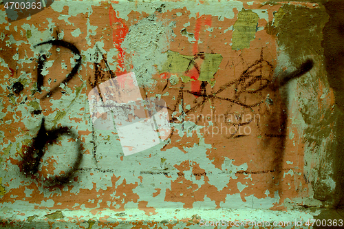 Image of Old dilapidated wall texture with graffiti