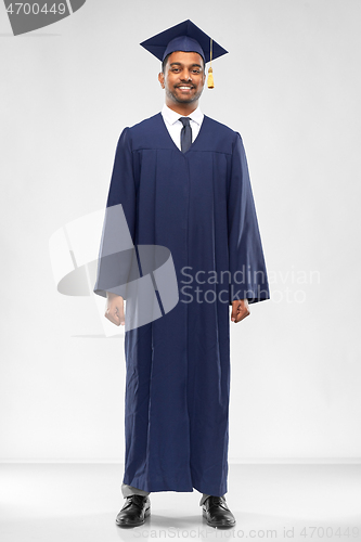 Image of graduate student in mortar board and bachelor gown