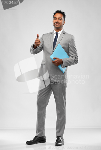 Image of indian businessman showing thumbs up