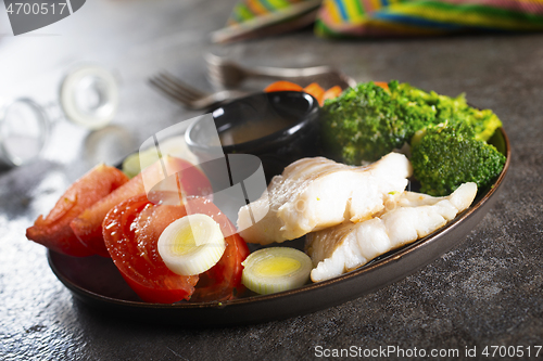 Image of fish with vegetables