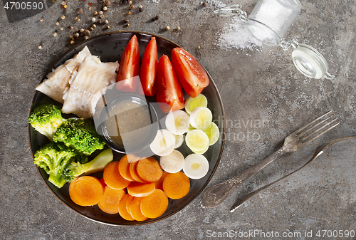 Image of fish with vegetables