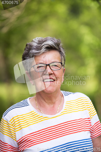 Image of happy  senior woman with eyeglasses