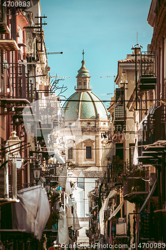 Image of Traditional Italian medieval narrov street in Plermo.