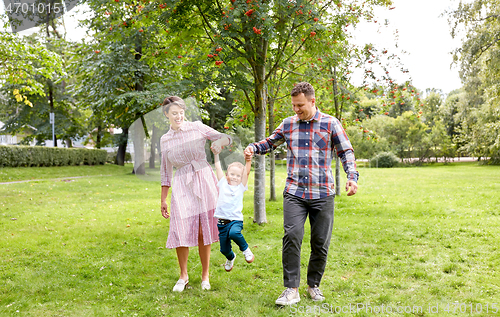 Image of happy family having fun at summer park