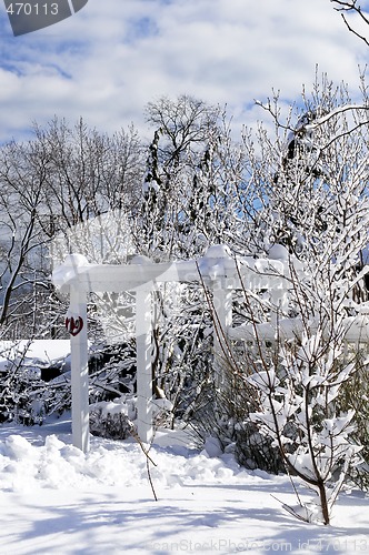 Image of Front yard of a house in winter