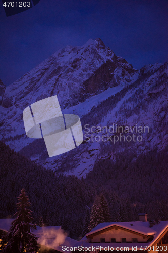 Image of mountain village in alps  at night