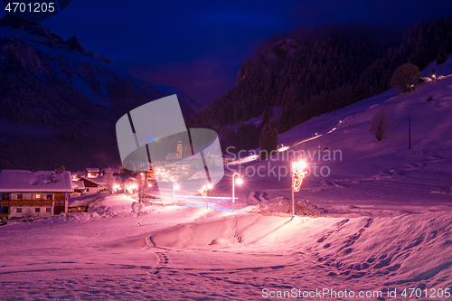 Image of mountain village in alps  at night