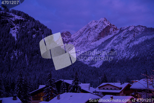 Image of mountain village in alps  at night