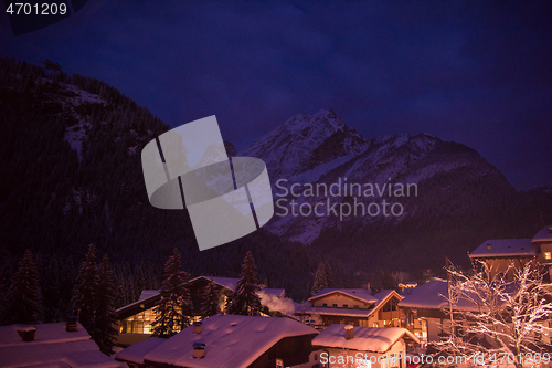 Image of mountain village in alps  at night