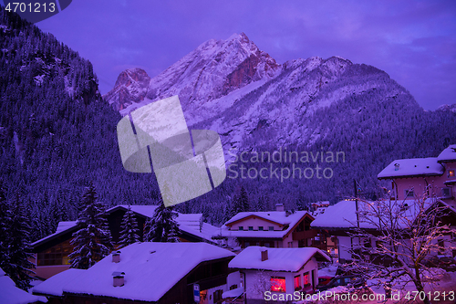 Image of mountain village in alps  at night