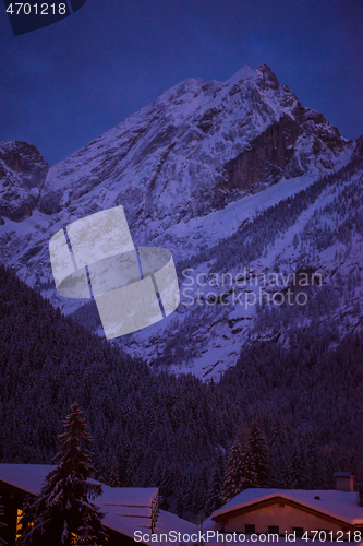 Image of mountain village in alps  at night