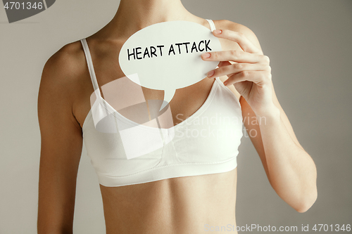 Image of Woman having a heart attack