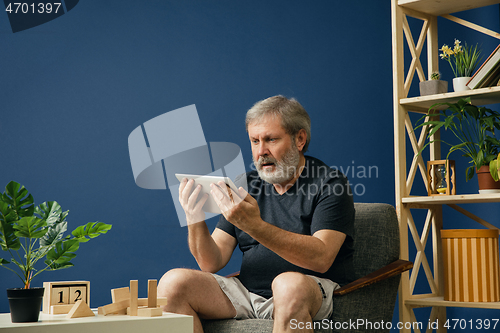 Image of Old bearded man with alzheimer desease