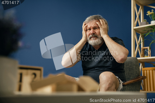 Image of Old bearded man with alzheimer desease