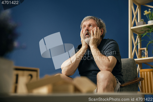 Image of Old bearded man with alzheimer desease