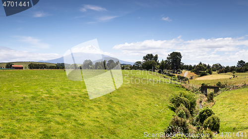 Image of volcano Taranaki covered in clouds, New Zealand 