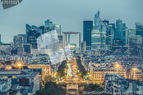 Image of La Defence, Paris business district at dusk.