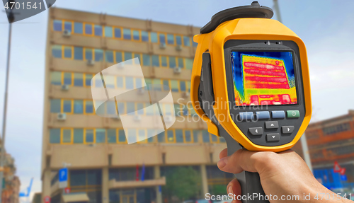 Image of Recording Heat Loss Outside building Using Infrared Thermal Came