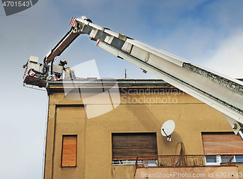 Image of Firefighters are repairing the chimney after Zagreb earthquake