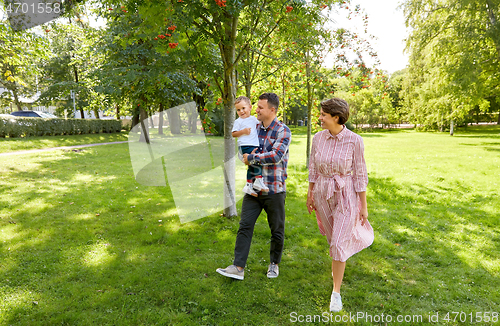 Image of happy family at summer park