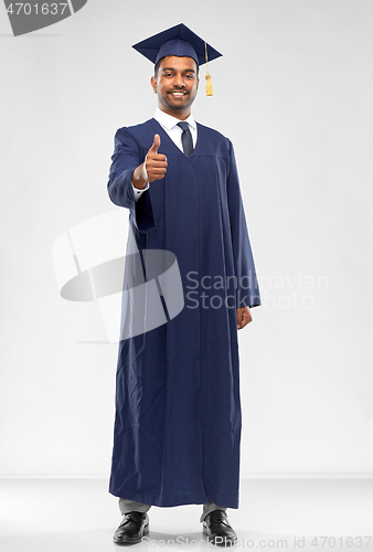 Image of indian male graduate student showing thumbs up