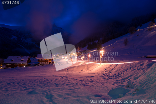 Image of mountain village in alps  at night