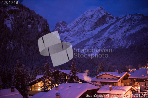 Image of mountain village in alps  at night