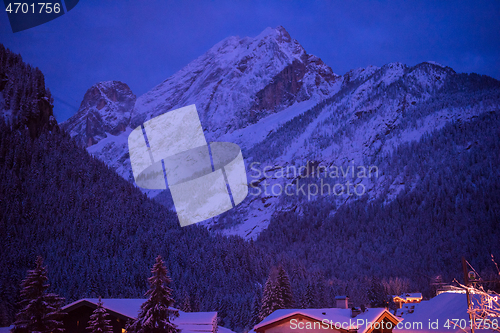 Image of mountain village in alps  at night