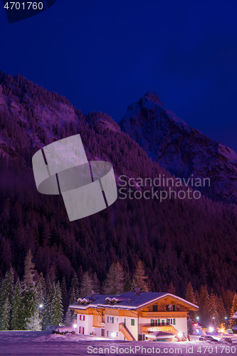Image of mountain village in alps  at night