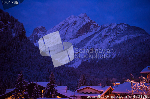 Image of mountain village in alps  at night