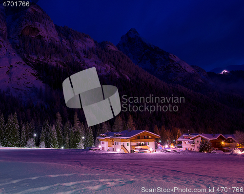 Image of mountain village in alps  at night