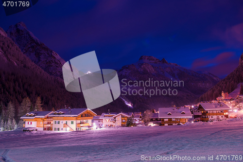 Image of mountain village in alps  at night