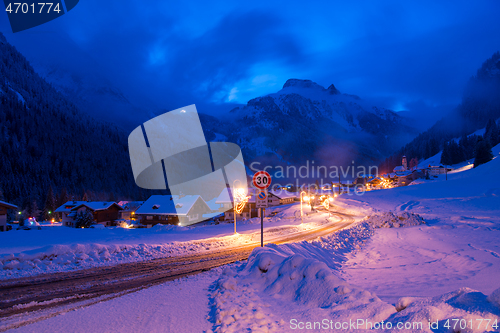 Image of mountain village in alps  at night