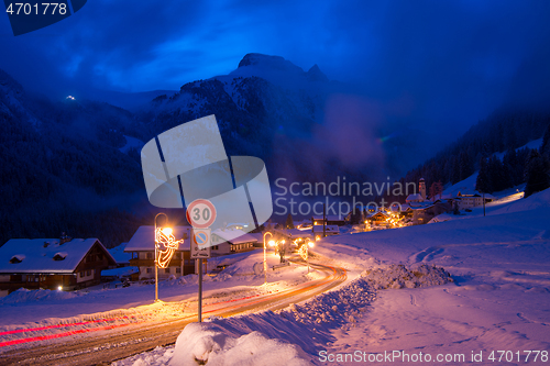 Image of mountain village in alps  at night