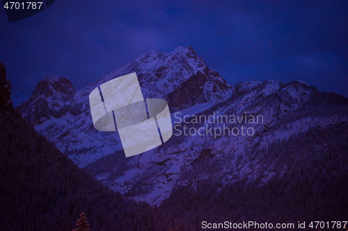 Image of mountain village in alps  at night