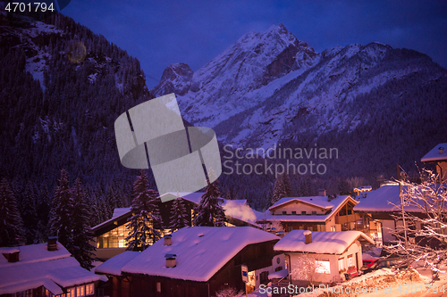 Image of mountain village in alps  at night