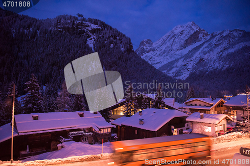 Image of mountain village in alps  at night