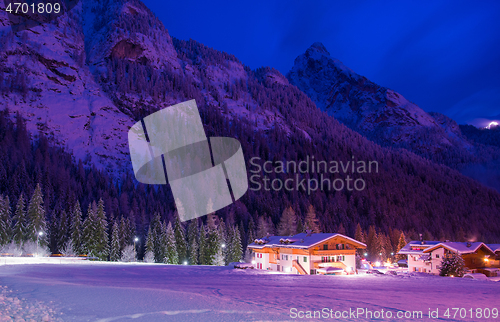 Image of mountain village in alps  at night