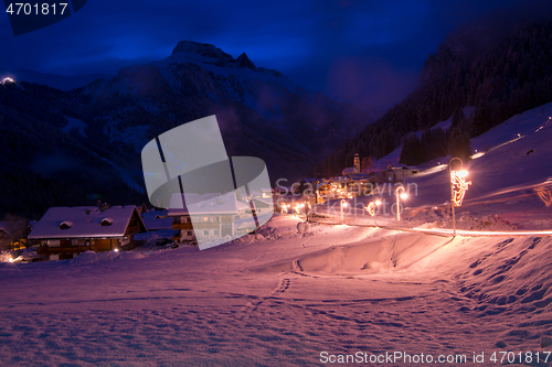 Image of mountain village in alps  at night