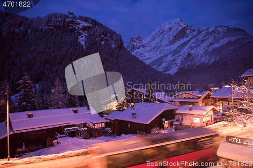 Image of mountain village in alps  at night