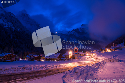 Image of mountain village in alps  at night