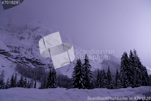 Image of mountain village in alps  at night