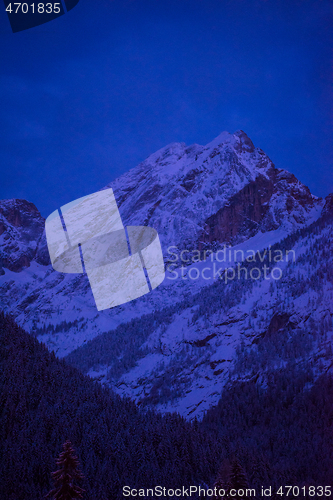 Image of mountain village in alps  at night