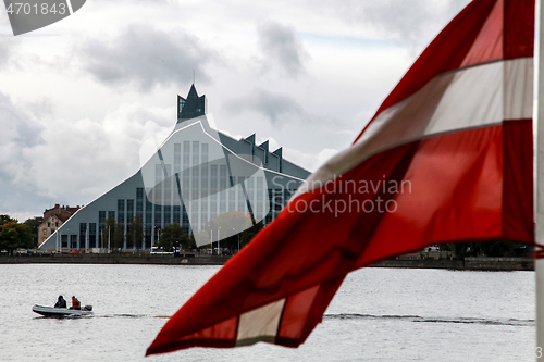 Image of National Library and flag of Latvia.