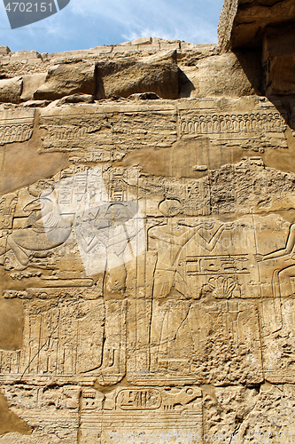 Image of Ancient stone wall with Egyptian hieroglyphs