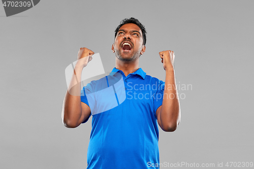 Image of indian man celebrating victory