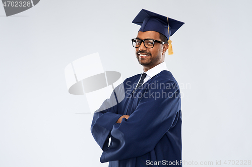 Image of graduate student in mortar board and bachelor gown