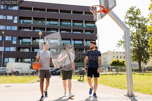 Image of group of male friends going to play basketball