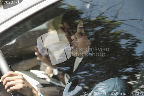 Image of Arabic Woman Couple Traveling By Car