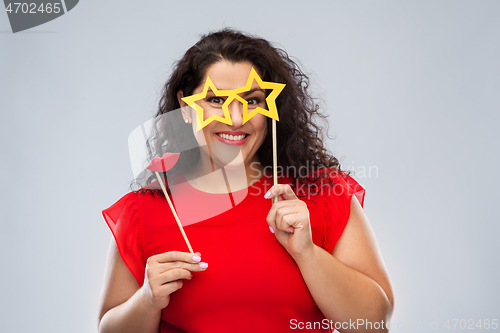 Image of funny woman with star shaped glasses and red lips